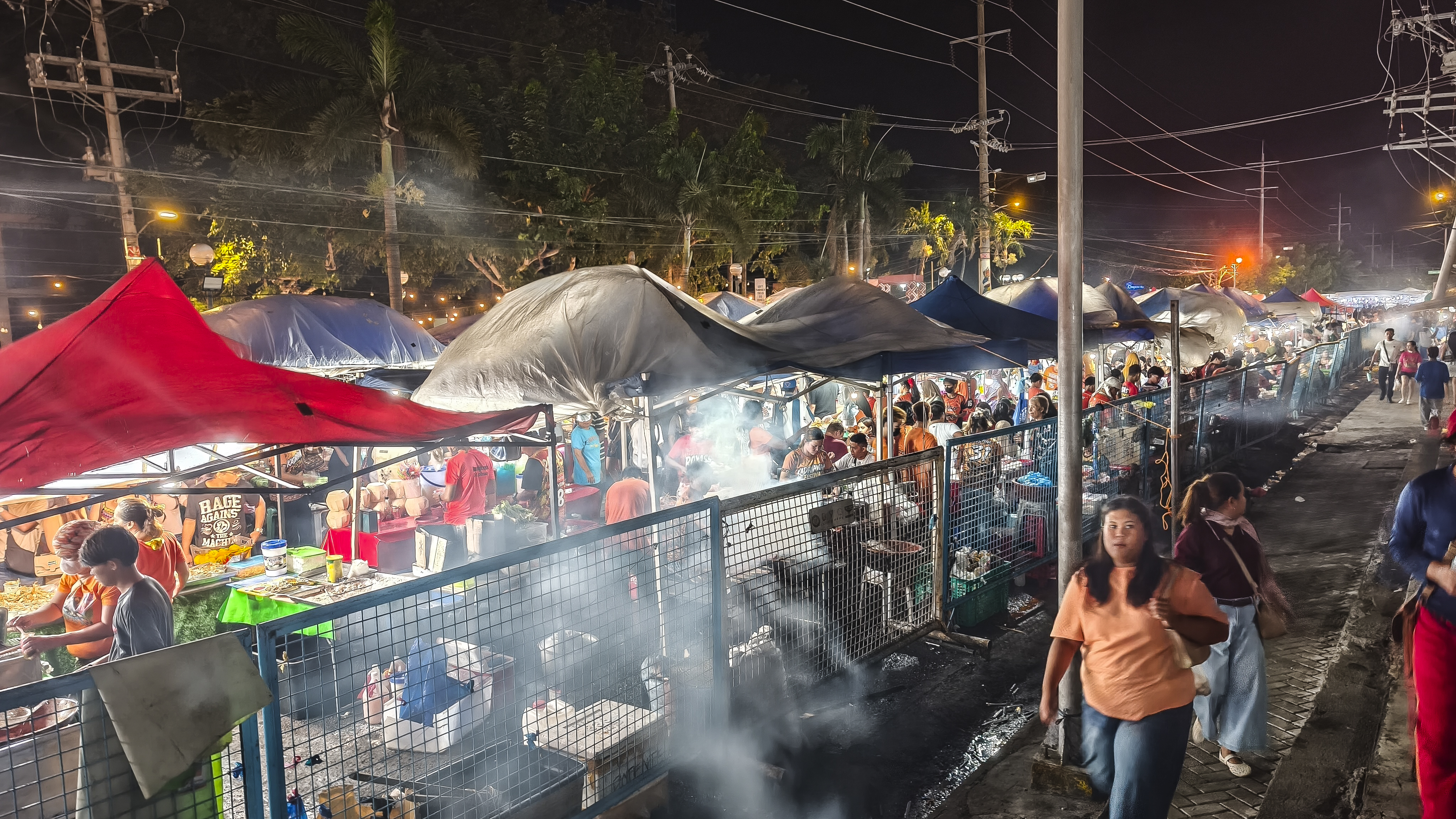 Illuminated food and retail stalls at Roxas Night Market in Davao City