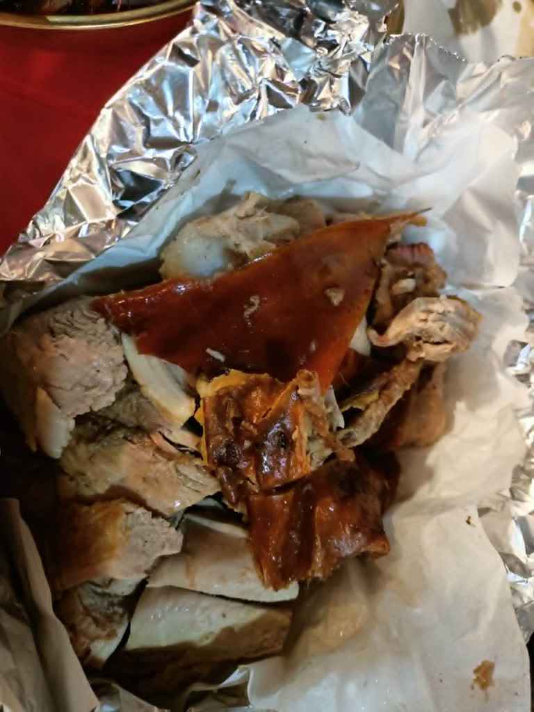 Cebu lechon with crisp roasted skin displayed at Puso Village in Cebu City